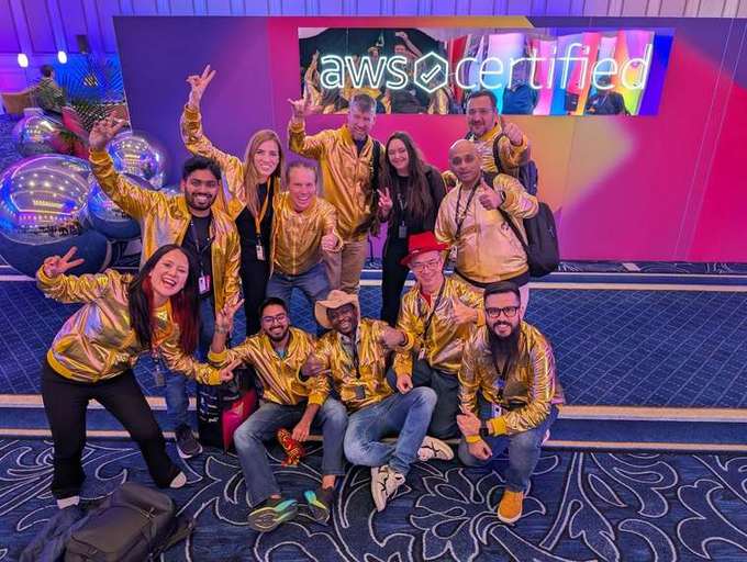 Pritish Anand at AWS re:Invent 2025, group celebration
